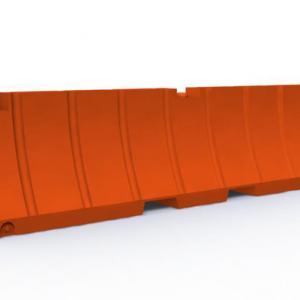 Orange plastic jersey barrier