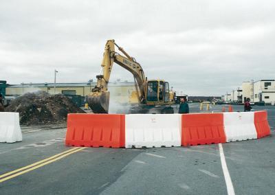 Plastic Jersey Barriers Securing A Construction Site