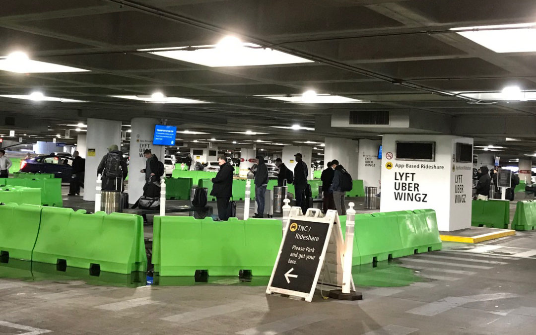 Plastic Jersey Barriers at Airport for Uber